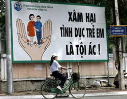 Poster trên đường phố SG. AFP photo